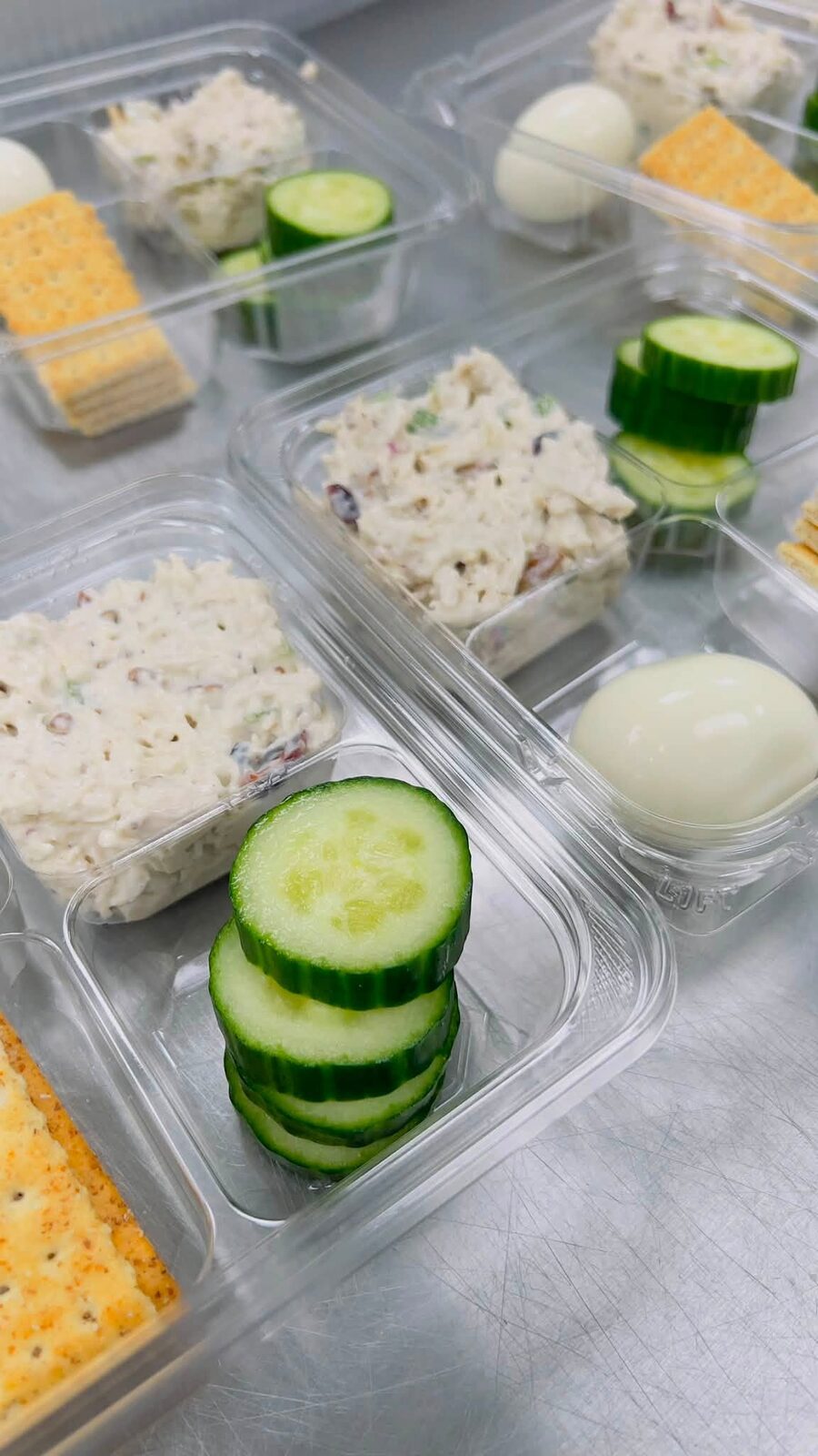 Chicken salad snack pack with cucumber and crackers