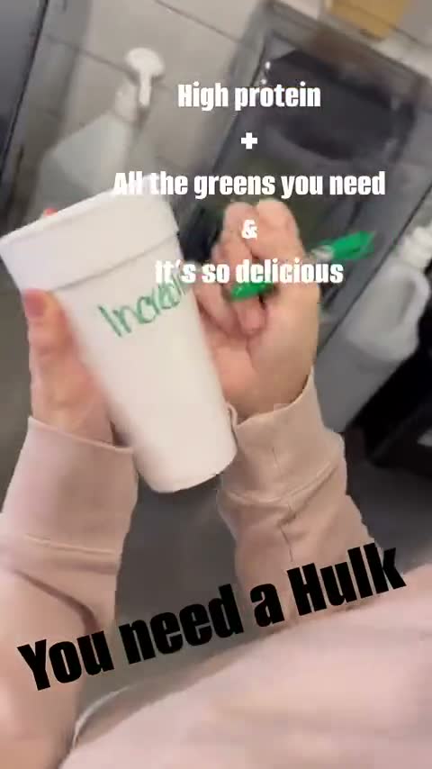 A cup being written on with Incredible Hulk in green marker — her reel: You need a Hulk